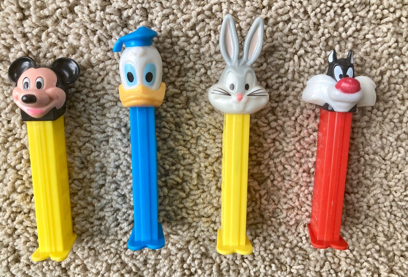 4 Vintage Pez Candy Dispensers Mickey Mouse Donald Duck Bugs Bunny Sylvester Cat